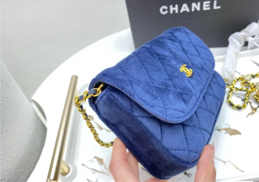 Blue suede Chanel woman handbag